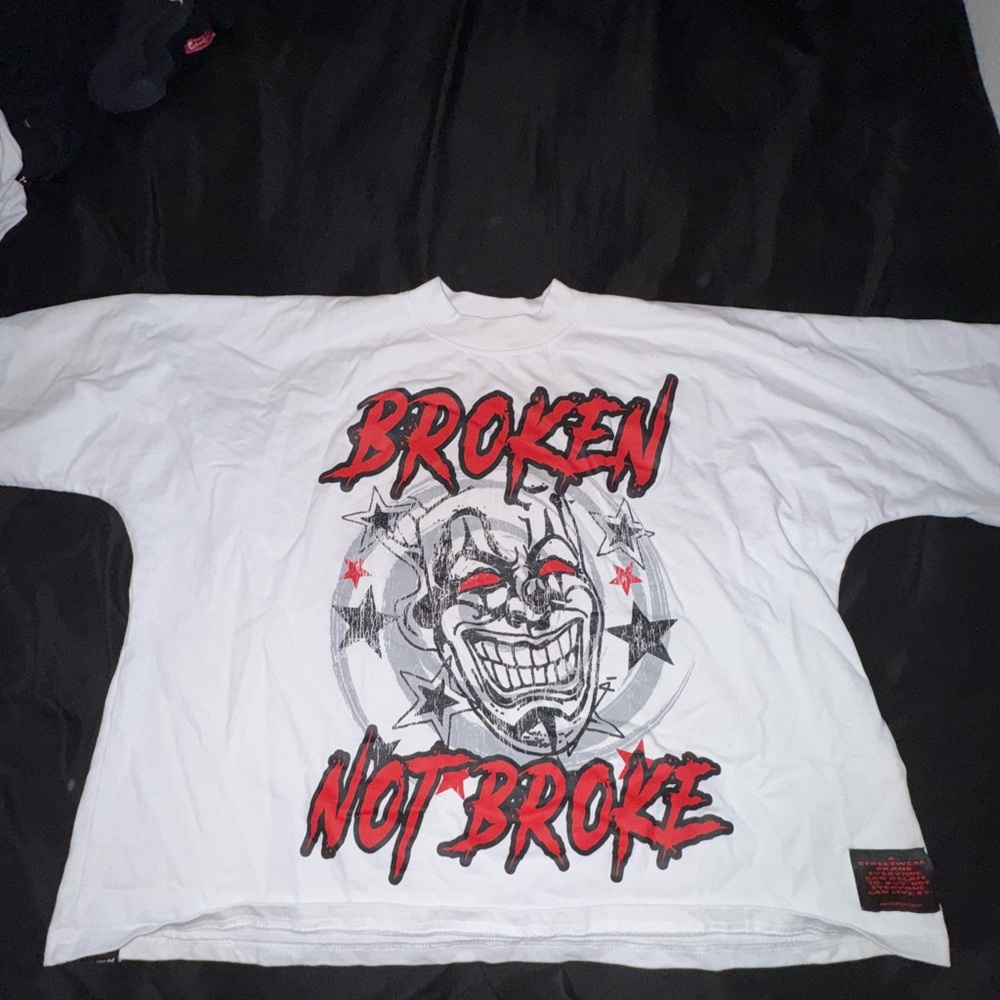 White Graphic Tee with Red and Black Design